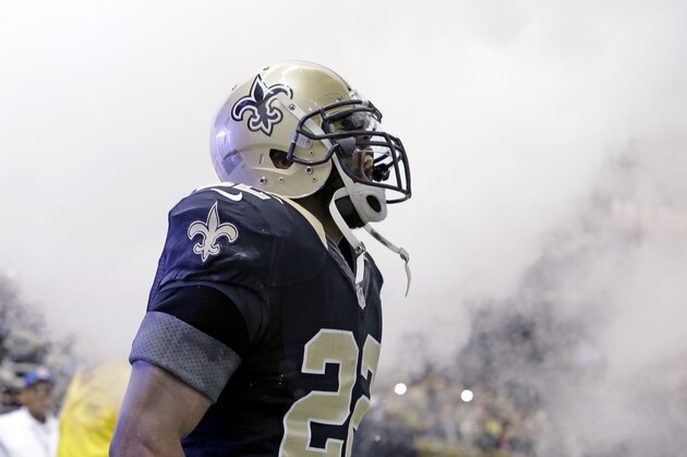 New Orleans Saints running back Mark Ingram (22) shouts as he is introduced before an NFL football game against the San Francisco 49ers in New Orleans, Sunday, Nov. 9, 2014. (AP Photo/Jonathan Bachman)