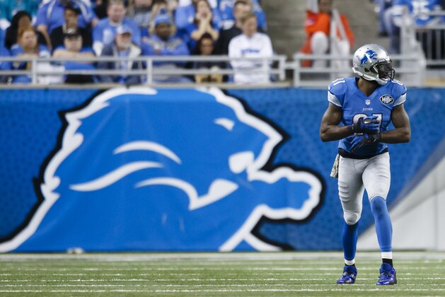 Detroit Lions wide receiver Calvin Johnson (81) gets set to run a route against the Miami Dolphins during an NFL football game at Ford Field in Detroit, Sunday, Nov. 9, 2014. (AP Photo/Rick Osentoski)