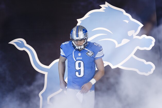 Detroit Lions quarterback Matthew Stafford (9) during player introductions before an NFL football game against the Miami Dolphins at Ford Field in Detroit, Sunday, Nov. 9, 2014. (AP Photo/Rick Osentoski)