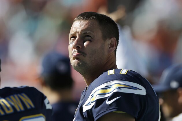 San Diego Chargers quarterback Philip Rivers (17) looks up to the scoreboard during the first half of an NFL football game against the Miami Dolphins, Sunday, Nov. 2, 2014, in Miami Gardens, Fla.  (AP Photo/Alan Diaz)