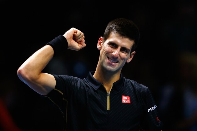 LONDON, ENGLAND - NOVEMBER 12:  Novak Djokovic of Serbia celebrates match point in the round robin singles match against Stan Wawrinka of Switzerland  on day four of the Barclays ATP World Tour Finals at the O2 Arena on November 12, 2014 in London, England.  (Photo by Julian Finney/Getty Images)