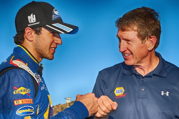 AVONDALE, AZ - NOVEMBER 08: (EDITOR'S NOTE: Image was processed using digital filters.) Chase Elliott, driver of the #9 NAPA Auto Parts Chevrolet, celebrates with his father Bill after winning the NASCAR Nationwide Series Championship following his fifth place finish in the DAV 200 at Phoenix International Raceway on November 8, 2014 in Avondale, Arizona.  (Photo by Todd Warshaw/Getty Images)