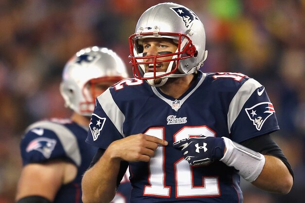 FOXBORO, MA - NOVEMBER 02:  Tom Brady #12 of the New England Patriots reacts during the second quarter against the Denver Broncos at Gillette Stadium on November 2, 2014 in Foxboro, Massachusetts.  (Photo by Jim Rogash/Getty Images)