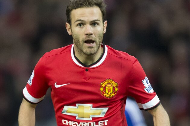 Manchester United's Juan Mata is seen during his team's English Premier League soccer match between Manchester United and Chelsea at Old Trafford Stadium, Manchester, England, Sunday Oct. 26, 2014. (AP Photo/Jon Super)