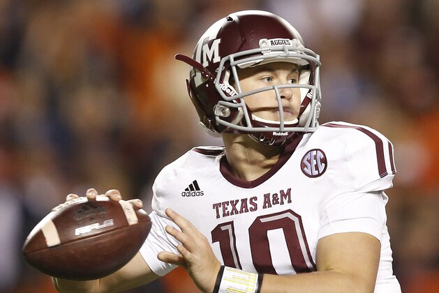 Texas A&M quarterback Kyle Allen (10) sets back to throw the ball against Auburn during the second half of an NCAA college football game Saturday, Nov. 8, 2014, in Auburn, Ala. Texas A&M defeated Auburn 41-38. (AP Photo/Brynn Anderson)