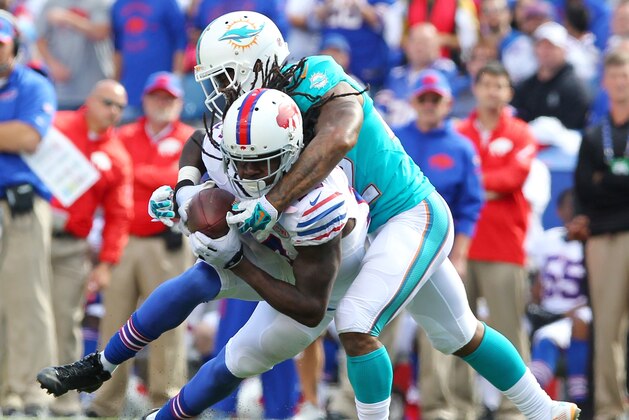 Buffalo Bills wide receiver Sammy Watkins (14) catches a pass against Miami Dolphins corner back Jamar Taylor (22) during the second half of an NFL football game on Sunday, Sept. 14, 2014, in Orchard Park, N.Y. (AP Photo/Bill Wippert)