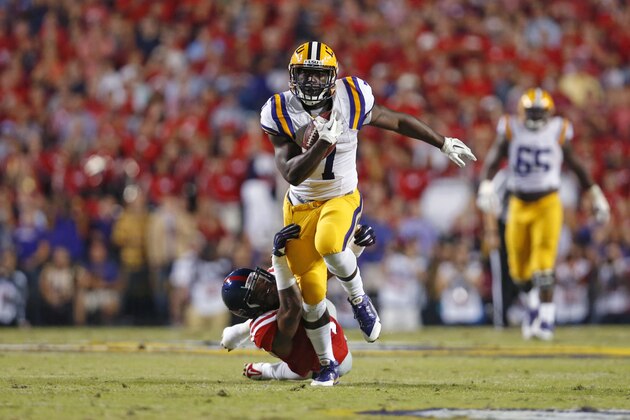 LSU running back Leonard Fournette (7) carries in the first half of an NCAA college football game against Mississippi in Baton Rouge, La., Saturday, Oct. 25, 2014. (AP Photo/Jonathan Bachman)