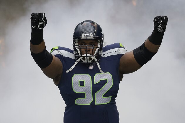 Seattle Seahawks' Brandon Mebane is introduced before an NFL football game against the St. Louis Rams, Sunday, Dec. 29, 2013, in Seattle. (AP Photo/Elaine Thompson)