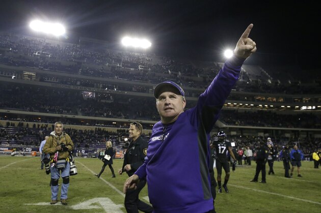 TCU head coach Gary Patterson points to fans as he runs off the field after an NCAA college football game against Kansas State Saturday, Nov. 8, 2014, in Fort Worth, Texas. TCU won 41-20. (AP Photo/LM Otero)