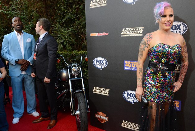 Sep 9, 2014; Los Angeles, CA, USA;  NBA former player Gary Peyton (left) and Bec Rawlings from Launceston, Tasmania arrive on the Red Carpet at Lure Nightclub for the premier of The Ultimate Fighter women in the newly formed women in the strawweight class. Mandatory Credit: Jayne Kamin-Oncea-USA TODAY Sports