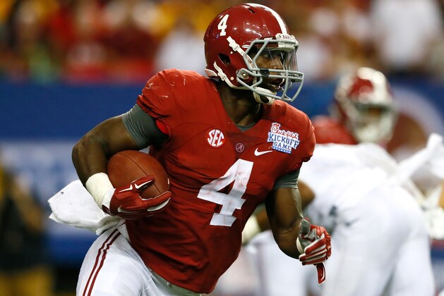 ATLANTA, GA - AUGUST 30:  T.J. Yeldon #4 of the Alabama Crimson Tide rushes upfield against the West Virginia Mountaineers at Georgia Dome on August 30, 2014 in Atlanta, Georgia.  (Photo by Kevin C. Cox/Getty Images)