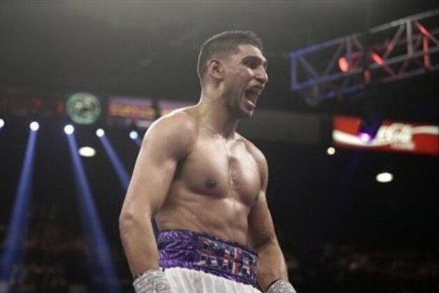 Amir Khan, from England, is seen during his silver welterweight title boxing fight Luis Collazo Saturday, May 3, 2014, in Las Vegas. (AP Photo/Isaac Brekken)
