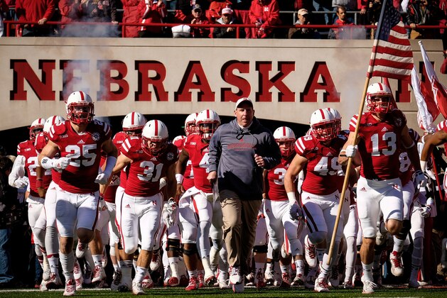 LINCOLN, NE - NOVEMBER 1: Nebraska Cornhuskers head coach Bo Pelini leads his team on the field before their game against the Purdue Boilermakers at Memorial Stadium on November 1, 2014 in Lincoln, Nebraska. Nebraska defeated Purdue 35-14. (Photo by Eric Francis/Getty Images)