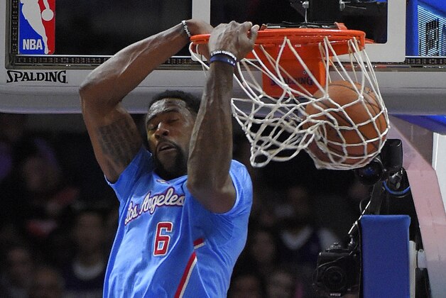 Los Angeles Clippers center DeAndre Jordan dunks during the second half of an NBA basketball game against the Sacramento Kings, Sunday, Nov. 2, 2014, in Los Angeles. The Kings won 98-92. (AP Photo/Mark J. Terrill)