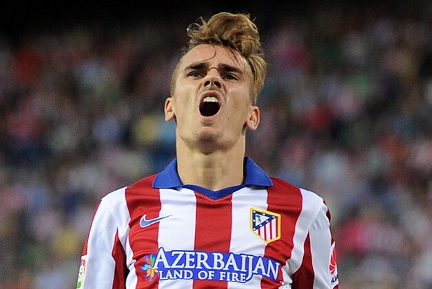 MADRID, SPAIN - SEPTEMBER 20:  Antoine Griezmann of Club Atletico de Madrid reacts after failing to score from a header during the La Liga match at the Vicente Calderon stadium on September 20, 2014 in Madrid, Spain.  (Photo by Denis Doyle/Getty Images)