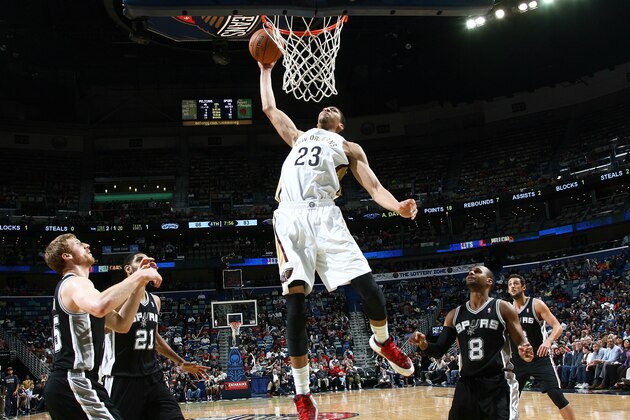NEW ORLEANS, LA - JANUARY 13: Anthony Davis #23 of the New Orleans Pelicans goes up for the dunk against the San Antonio Spurs during an NBA game on January 13, 2014 at the New Orleans Arena in New Orleans, Louisiana. NOTE TO USER: User expressly acknowledges and agrees that, by downloading and or using this Photograph, user is consenting to the terms and conditions of the Getty Images License Agreement. Mandatory Copyright Notice: Copyright 2014 NBAE (Photo by Layne Murdoch/NBAE via Getty Images)