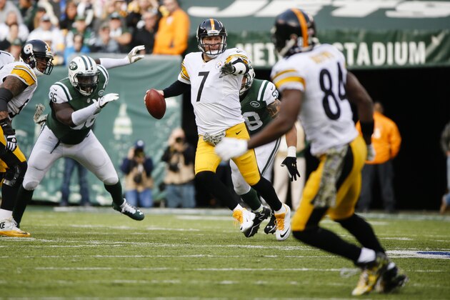 Pittsburgh Steelers quarterback Ben Roethlisberger (7) looks to pass as New York Jets' Muhammad Wilkerson (96) rushes toward him during the first half of an NFL football game Sunday, Nov. 9, 2014, in East Rutherford, N.J. (AP Photo/Kathy Willens)