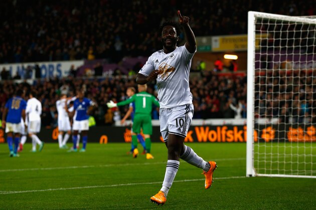SWANSEA, WALES - OCTOBER 25:  Wilfried Bony of Swansea City celebrates scoring their second goal during the Barclays Premier League match between Swansea City and Leicester City at Liberty Stadium on October 25, 2014 in Swansea, Wales.  (Photo by Clive Rose/Getty Images)