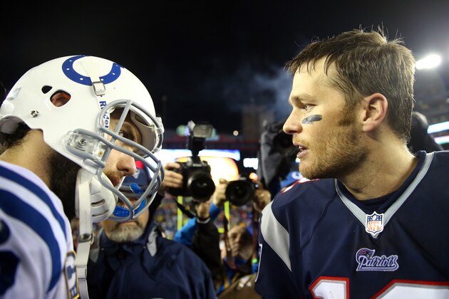 FOXBORO, MA - JANUARY 11:  Tom Brady (R) #12 of the New England Patriots shakes hands with Andrew Luck (L) #12 of the Indianapolis Colts after their AFC Divisional Playoff game at Gillette Stadium on January 11, 2014 in Foxboro, Massachusetts. The New England Patriots defeated the Indianapolis Colts 43 to 22.  (Photo by Elsa/Getty Images)