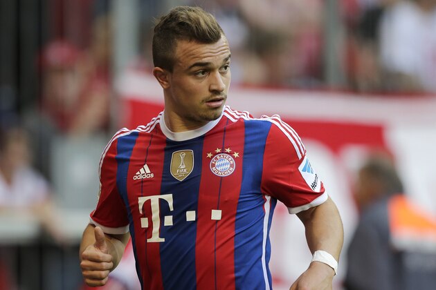 Bayern's Xherdan Shaqiri of Switzerland watches his team mates during the German first division Bundesliga soccer match between FC Bayern and SV Werder Bremen in the Allianz Arena in Munich, Germany, on Saturday, Oct. 18, 2014. (AP Photo/Matthias Schrader)