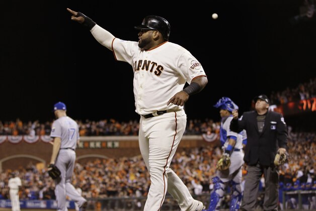 San Francisco Giants Pablo Sandoval celebrates after scoring on a two-run RBI double by Juan Perez during the eighth inning of Game 5 of baseball's World Series Sunday, Oct. 26, 2014, in San Francisco. (AP Photo/Matt Slocum)