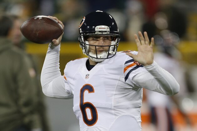 Chicago Bears quarterback Jay Cutler (6) warms up before of an NFL football game against the Green Bay Packers Sunday, Nov. 9, 2014, in Green Bay, Wis. (AP Photo/Mike Roemer)