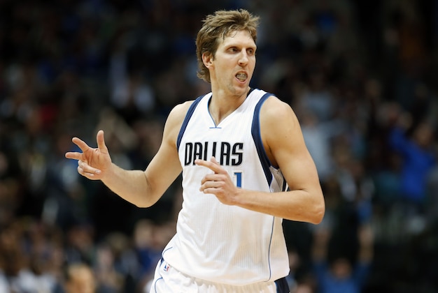 Nov 11, 2014; Dallas, TX, USA; Dallas Mavericks forward Dirk Nowitzki (41) reacts after scoring during the game against the Sacramento Kings at American Airlines Center. Mandatory Credit: Kevin Jairaj-USA TODAY Sports