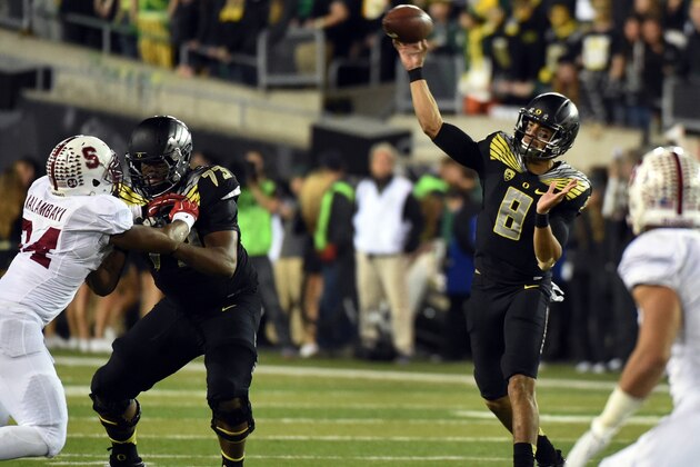 EUGENE, OR - NOVEMBER 1: Quarterback Marcus Mariota #8 of the Oregon Ducks passes the ball during the third quarter of the game against the Stanford Cardinal at Autzen Stadium on November 1, 2014 in Eugene, Oregon. The Ducks won the game 45-16. (Photo by Steve Dykes/Getty Images)