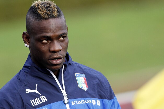 Italian national soccer team's Mario Balotelli attends a training session with the team at the Coverciano Training Center, near Florence, central Italy, Monday, Nov.10, 2014. Italy will play Croatia in Milan on Sunday in a Euro2016, Group H, qualifying round soccer match. (AP Photo/Fabrizio Giovannozzi)