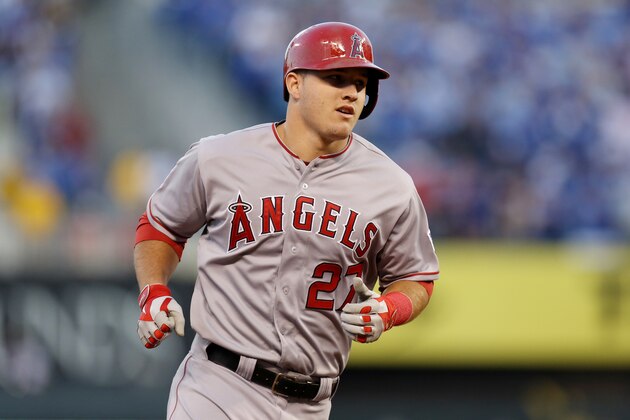 KANSAS CITY, MO - OCTOBER 05:  Mike Trout #27 of the Los Angeles Angels rounds the bases after hitting a home run in the first inning against the Kansas City Royals during Game Three of the American League Division Series at Kauffman Stadium on October 5, 2014 in Kansas City, Missouri.  (Photo by Ed Zurga/Getty Images)