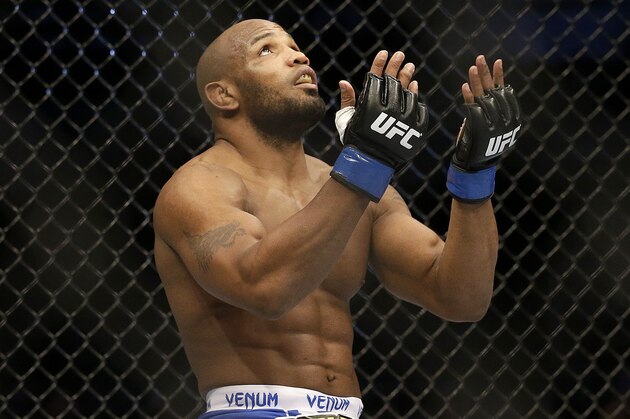 Yoel Romero celebrates after beating Clifford Starks in a UFC middleweight mixed martial arts fight in San Jose, Calif., Saturday, April 20, 2013. Romero won by knock out in the first round. (AP Photo/Jeff Chiu)