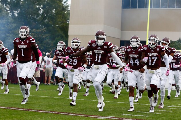 STARKVILLE, MS - OCTOBER 11:  The Mississippi State Bulldogs enter the field prior to facing the Auburn Tigers at Davis Wade Stadium on October 11, 2014 in Starkville, Mississippi.  (Photo by Kevin C. Cox/Getty Images)