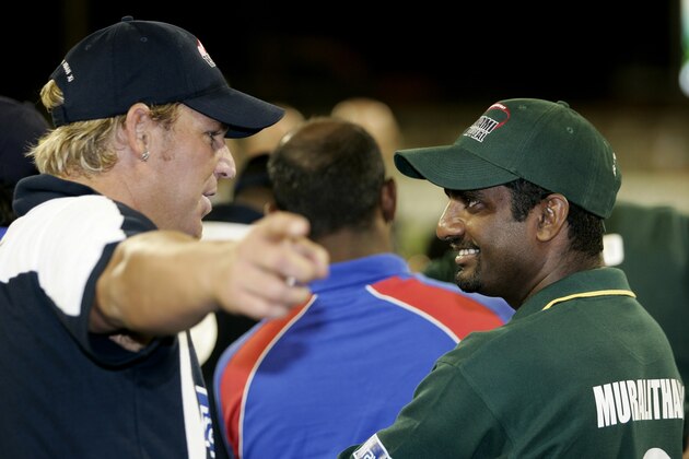 Asian XI bowler Muttiah Muralitharan, right, chats with World XI bowler Shane Warne after their the one day international charity cricket match at the Melbourne Cricket Ground, Australia, Monday, Jan. 10, 2005 for victims of the Boxing Day 2004 tsunami. The World XI defeated the Asian XI by 112 runs and the match raised over A$14 million dollars (US$12 million) for World Vision's tsunami appeal. (AP Photo/Mark Baker)