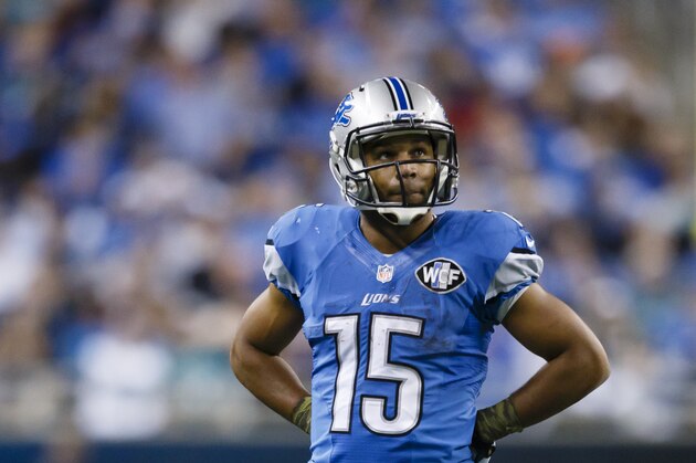 Detroit Lions wide receiver Golden Tate (15) stands on the field against the Miami Dolphins during an NFL football game at Ford Field in Detroit, Sunday, Nov. 9, 2014. (AP Photo/Rick Osentoski)