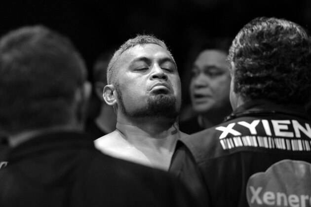 BRISBANE, AUSTRALIA - DECEMBER 07:  Mark Hunt is checked out by cuts man Jacob 'Stitch' Duran before the UFC Brisbane bout between Mark Hunt and Antonio 'Big Foot' Silva of Brazil at the Brisbane Entertainment Centre on December 7, 2013 in Brisbane, Australia.  (Photo by Bradley Kanaris/Getty Images)