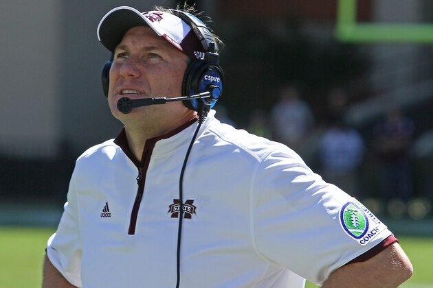 Mississippi State coach Dan Mullen watches the video board during the second half of an NCAA college football game against Texas A&M  in Starkville, Miss., Saturday, Oct. 4, 2014. (AP Photo/Jim Lytle)