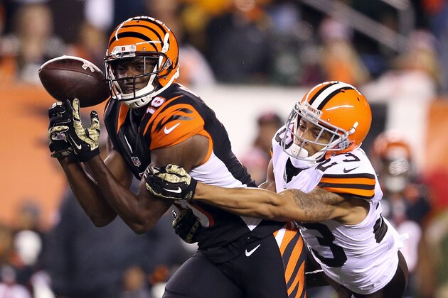 CINCINNATI, OH - NOVEMBER 6 :  A.J. Green #18 of the Cincinnati Bengals drops a pass while being defended by Joe Haden #23 of the Cleveland Browns during the third quarter at Paul Brown Stadium on November 6, 2014 in Cincinnati, Ohio. (Photo by Andy Lyons/Getty Images)