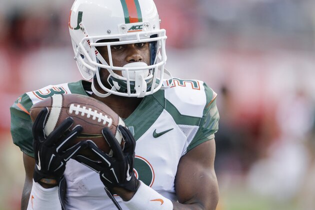 Miami wide receiver Stacy Coley (3) makes a catch before an NCAA college football game against Nebraska in Lincoln, Neb., Saturday, Sept. 20, 2014. (AP Photo/Nati Harnik)