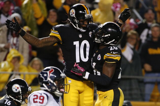 Pittsburgh Steelers wide receiver Martavis Bryant (10) celebrates his touchdown with strong safety Will Allen (20) in the first half of the NFL football game against the Houston Texans, Monday, Oct. 20, 2014 in Pittsburgh. The Steelers won 30-23. (AP Photo/Gene J. Puskar)
