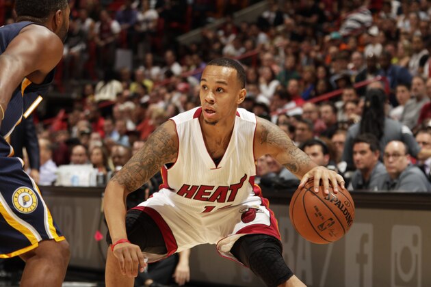 MIAMI, FL - November 12:   Shabazz Napier #13 of the Miami Heat handles the ball against the Indiana Pacers at the American Airlines Arena in Miami, Florida on November 12, 2014. NOTE TO USER: User expressly acknowledges and agrees that, by downloading and/or using this photograph, user is consenting to the terms and conditions of the Getty Images License Agreement. Mandatory copyright notice: Copyright NBAE 2014 (Photo by Issac Baldizon/NBAE via Getty Images)