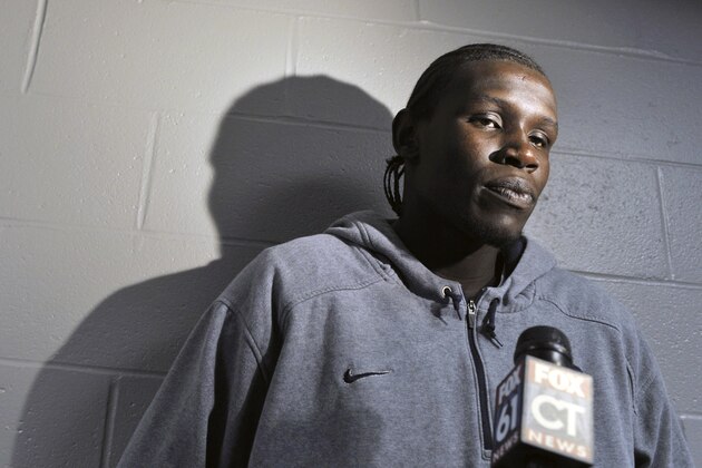 FILE - In this May 7, 2010 file photo, Connecticut's Ater Majok speaks to the media after a news conference for men's basketball coach Jim Calhoun in Storrs, Conn. The school announced Wednesday, Sept. 1, 2010, Majok had withdrawn from school after playing just 26 games for the Huskies. No reason was given. (AP Photo/Jessica Hill, File)