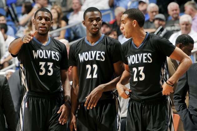ORLANDO, FL - NOVEMBER 7: Thaddeus Young #33, Andrew Wiggins #22, and Kevin Martin #23 of the Minnesota Timberwolves stand on the court during a game against the Orlando Magic on November 7, 2014 at Amway Center in Orlando, Florida. NOTE TO USER: User expressly acknowledges and agrees that, by downloading and or using this photograph, User is consenting to the terms and conditions of the Getty Images License Agreement. Mandatory Copyright Notice: Copyright 2014 NBAE (Photo by Fernando Medina/NBAE via Getty Images)