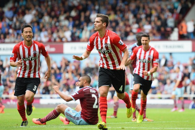 LONDON, ENGLAND - AUGUST 30: Morgan Schneiderlin of Southampton celebrates scoring the equalising goal during the Barclays Premier League match between West Ham United and Southampton at Boleyn Ground on August 30, 2014 in London, England.  (Photo by Jamie McDonald/Getty Images)
