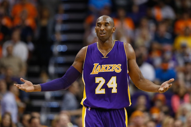 PHOENIX, AZ - OCTOBER 29:  Kobe Bryant #24 of the Los Angeles Lakers reacts during the NBA game against the Phoenix Suns at US Airways Center on October 29, 2014 in Phoenix, Arizona. The Suns defeated the Lakers 119-99. NOTE TO USER: User expressly acknowledges and agrees that, by downloading and or using this photograph, User is consenting to the terms and conditions of the Getty Images License Agreement.  (Photo by Christian Petersen/Getty Images)
