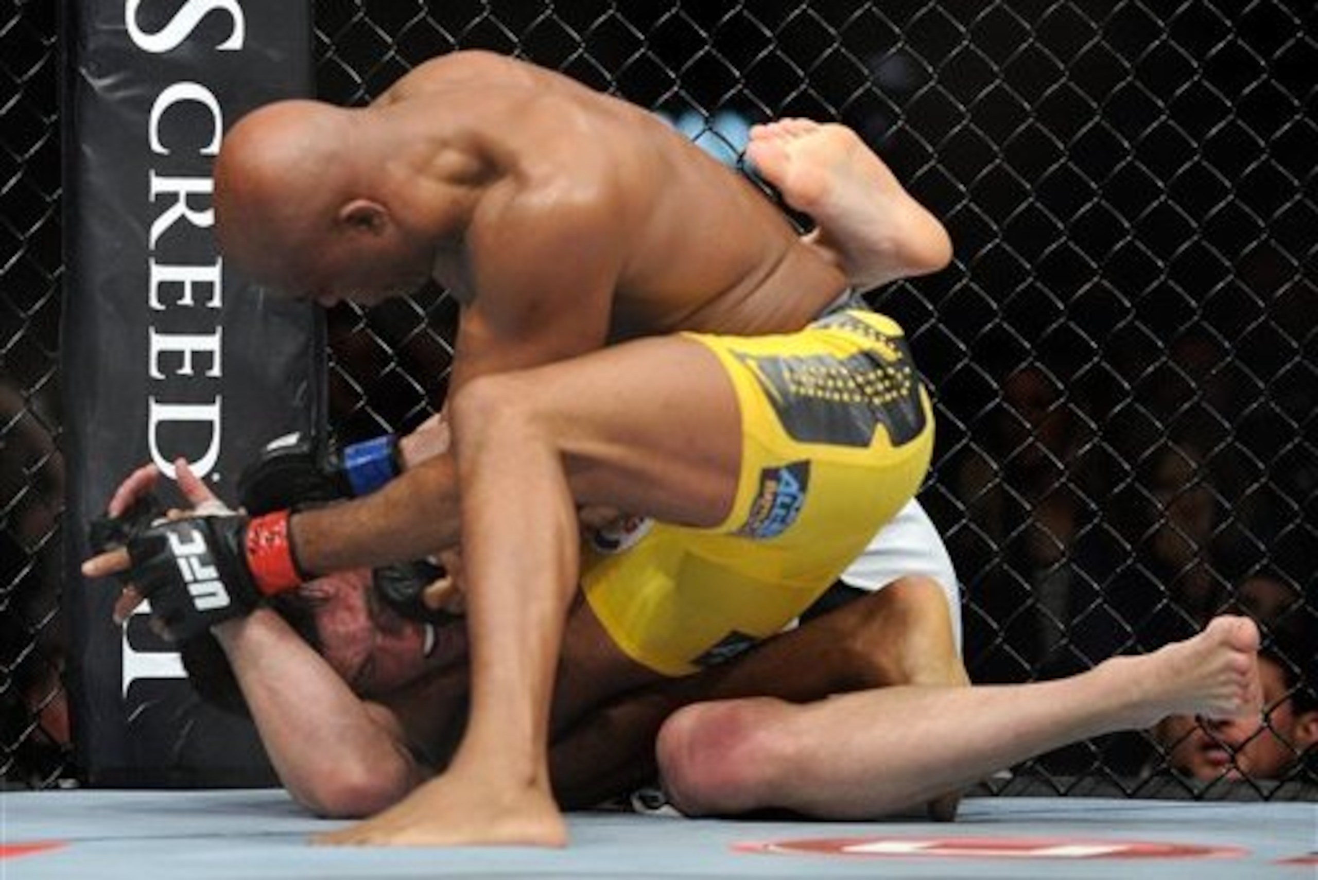 Anderson Silva and Chael Sonnen battle it out during their UFC 148 middleweight championship fight at the MGM Grand Garden Arena Saturday, July 7, 2012 in Las  Vegas. Silva won with a TKO in the second round. (AP Photo/David Becker)