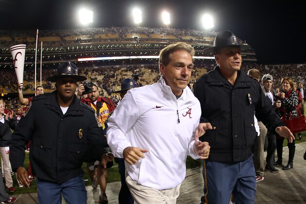 BATON ROUGE, LA - NOVEMBER 08:  Head coach Nick Saban of the Alabama Crimson Tide walks off the field after defeating the LSU Tigers in overtime at Tiger Stadium on November 8, 2014 in Baton Rouge, Louisiana.  (Photo by Chris Graythen/Getty Images)