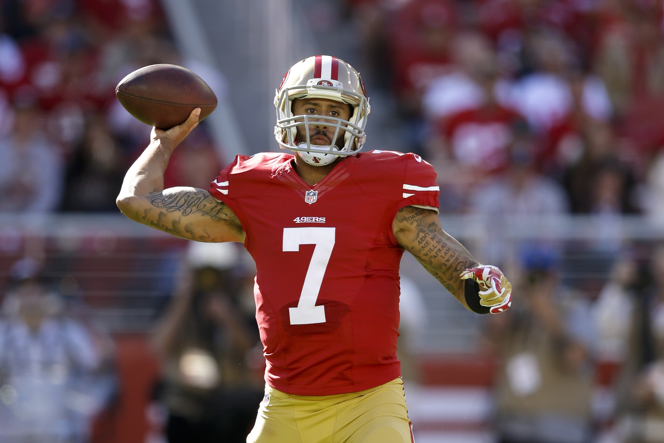 SANTA CLARA, CA - NOVEMBER 02: Colin Kaepernick #7 of the San Francisco 49ers passes the ball against the St. Louis Rams during the first quarter at Levi's Stadium on November 2, 2014 in Santa Clara, California.  (Photo by Ezra Shaw/Getty Images)