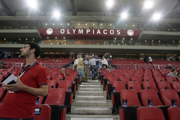 ATHENS, GREECE - SEPTEMBER 16:    Fans before the Champions League Group A soccer match between Olympiakos and Atletico Madrid at Georgios Karaiskakis Stadium on September 16,2014 in  Piraeus, Athens, Greece.   (Photo by Milos Bicanski/Getty Images)