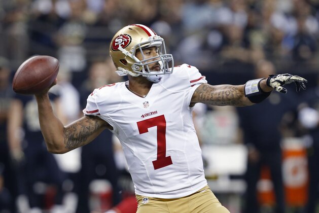 San Francisco 49ers quarterback Colin Kaepernick (7) passes in the first half of an NFL football game against the New Orleans Saints in New Orleans, Sunday, Nov. 9, 2014. (AP Photo/Jonathan Bachman)