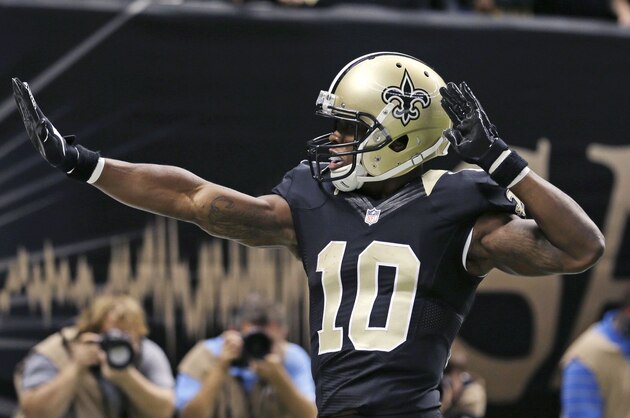 New Orleans Saints wide receiver Brandin Cooks (10) celebrates his touchdown in the first half of an NFL football game against the Green Bay Packers in New Orleans, Sunday, Oct. 26, 2014. (AP Photo/Bill Haber)